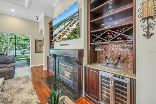 Fireplace, Interior, Recessed Lighting, Wine Storage, Wood Texture Flooring