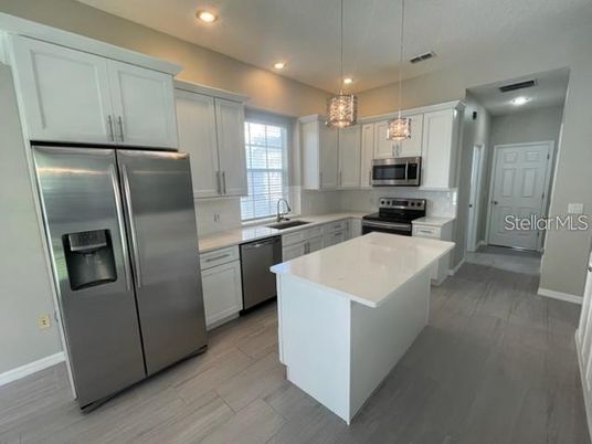 Interior, Kitchen, Pendant Lights, Recessed Lighting, Stainless Steel Appliances, Wood Texture Flooring
