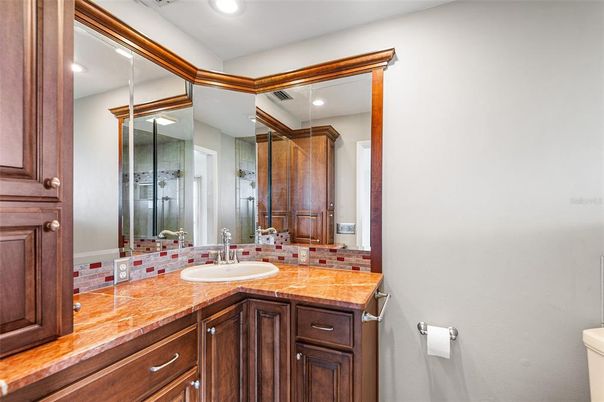 Bathroom, Dual Sink Vanities, Glass Shower, Interior, Recessed Lighting, Tile Countertops