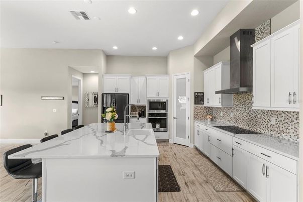 Interior, Kitchen, Recessed Lighting, Stainless Steel Appliances, Wood Texture Flooring