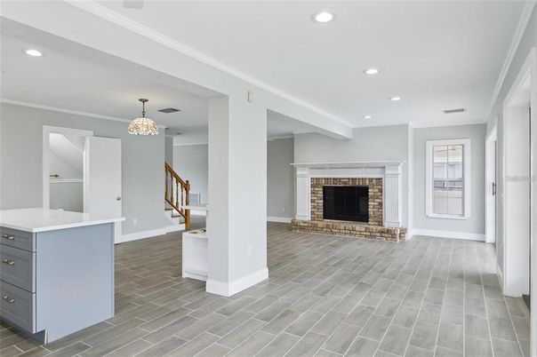 Chandelier, Fireplace, Interior, Pendant Lights, Recessed Lighting, Wood Texture Flooring