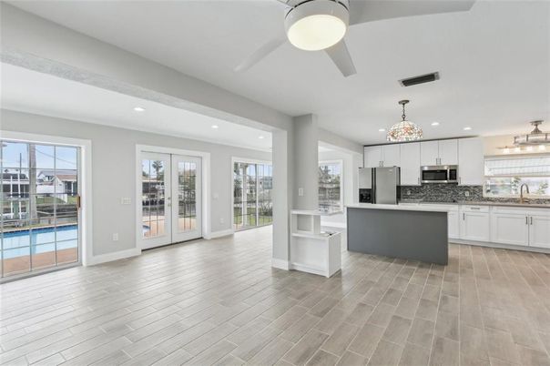 Interior, Kitchen, Pendant Lights, Recessed Lighting, Stainless Steel Appliances, Wood Texture Flooring