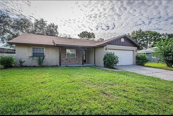 Attached, Backyard, Exterior, Facade, Brick Facade, Ranch