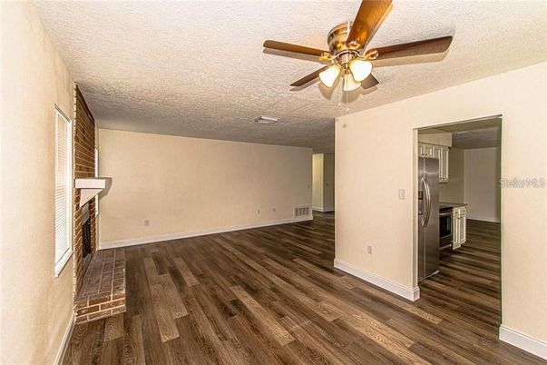 Empty room, Interior, Kitchen, Stainless Steel Appliances, Wood Texture Flooring