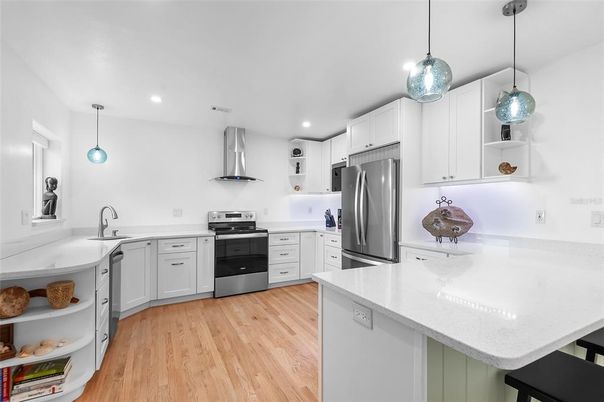 Interior, Kitchen, Pendant Lights, Recessed Lighting, Stainless Steel Appliances, Wood Texture Flooring