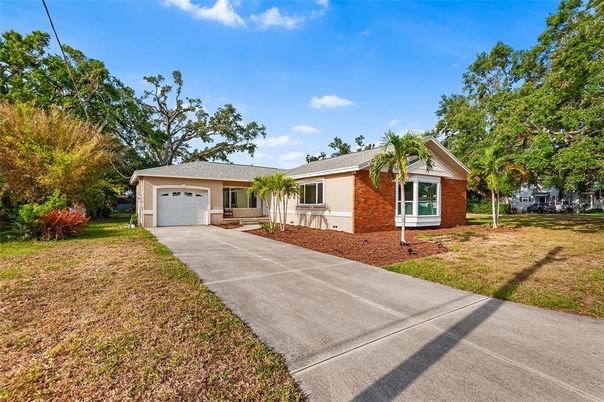 Attached, Backyard, Exterior, Facade, Brick Facade, Ranch