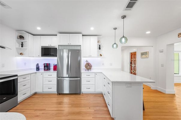 Interior, Kitchen, Pendant Lights, Recessed Lighting, Stainless Steel Appliances, Wood Texture Flooring