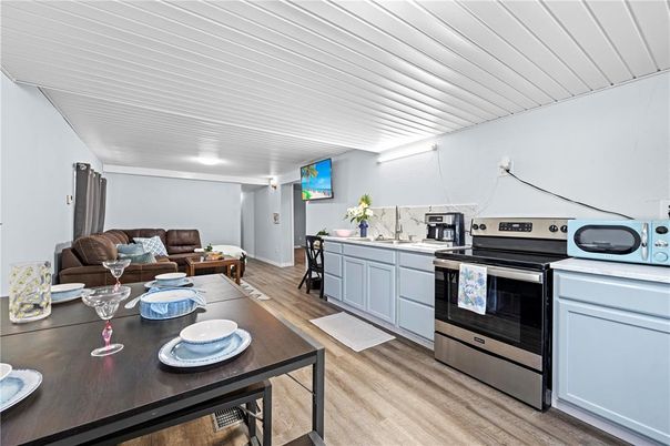 Dining room, Interior, Kitchen, Living room, Stainless Steel Appliances, Wood Texture Flooring
