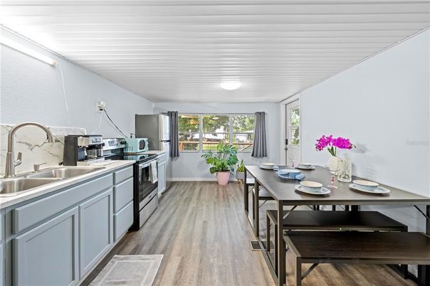 Dining room, Interior, Kitchen, Stainless Steel Appliances, Wood Texture Flooring