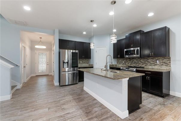 Interior, Kitchen, Pendant Lights, Recessed Lighting, Stainless Steel Appliances, Wood Texture Flooring