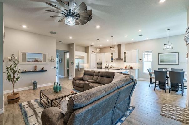 Dining room, Interior, Kitchen, Living room, Pendant Lights, Recessed Lighting, Stainless Steel Appliances, Wood Texture Flooring