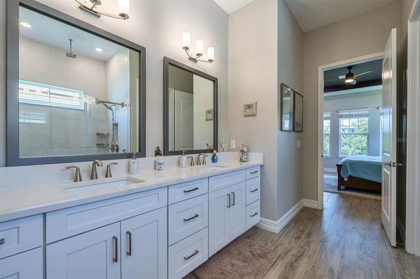 Bathroom, Bedroom, Dual Sink Vanities, Interior, Recessed Lighting, Wood Texture Flooring