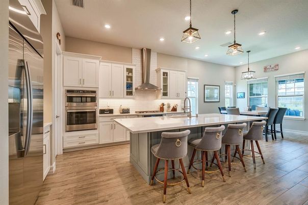 Dining room, Interior, Kitchen, Pendant Lights, Recessed Lighting, Stainless Steel Appliances, Wood Texture Flooring