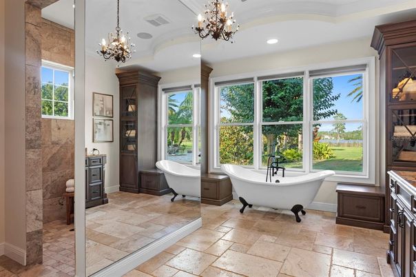 Bathroom, Chandelier, Free Standing Baths, Interior, Pendant Lights, Recessed Lighting