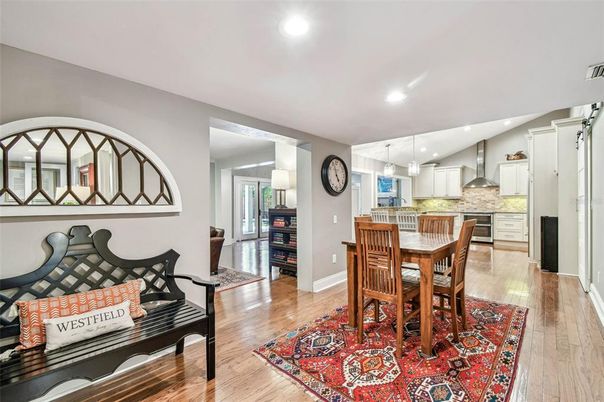 Dining room, Interior, Kitchen, Pendant Lights, Recessed Lighting, Stainless Steel Appliances, Wood Texture Flooring