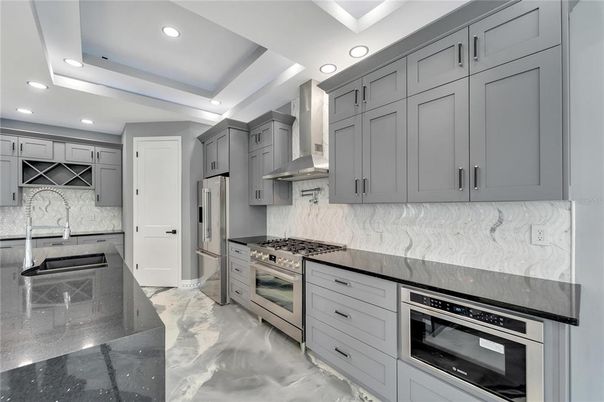Interior, Kitchen, Marble, Marble Walls, Recessed Lighting, Stainless Steel Appliances