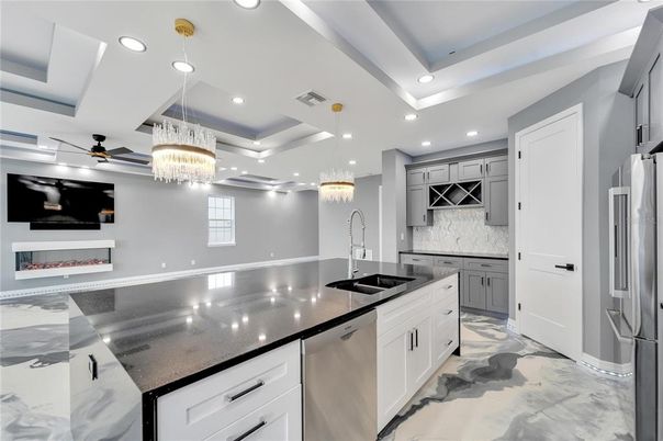 Chandelier, Interior, Kitchen, Marble, Pendant Lights, Recessed Lighting, Stainless Steel Appliances