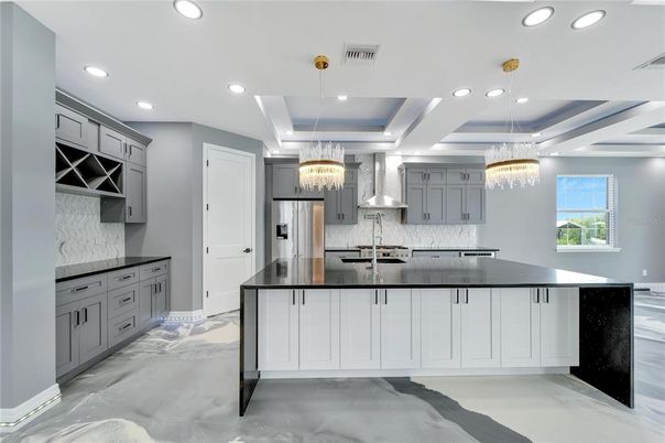 Chandelier, Interior, Kitchen, Marble, Pendant Lights, Recessed Lighting, Stainless Steel Appliances