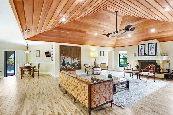 Dining room, Fireplace, Interior, Living room, Pendant Lights, Recessed Lighting, Wooden Ceilings, Wood Texture Flooring
