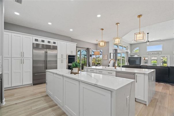 Interior, Kitchen, Pendant Lights, Recessed Lighting, Stainless Steel Appliances, Wood Texture Flooring