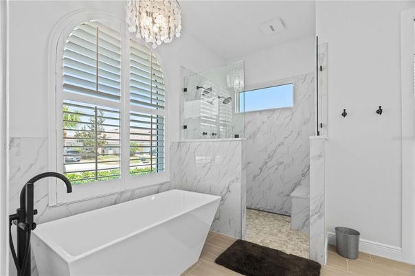 Bathroom, Free Standing Baths, Glass Shower, Interior, Marble, Marble Walls, Wood Texture Flooring