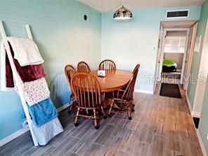 Dining room, Interior, Pendant Lights, Wood Texture Flooring