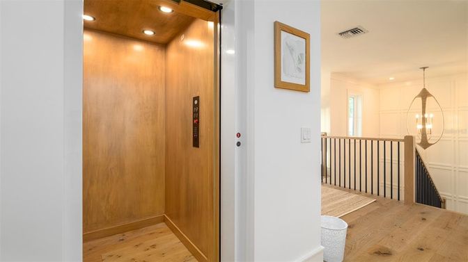 Elevator, Interior, Pendant Lights, Recessed Lighting, Wooden Ceilings, Wood Texture Flooring, Wooden Walls