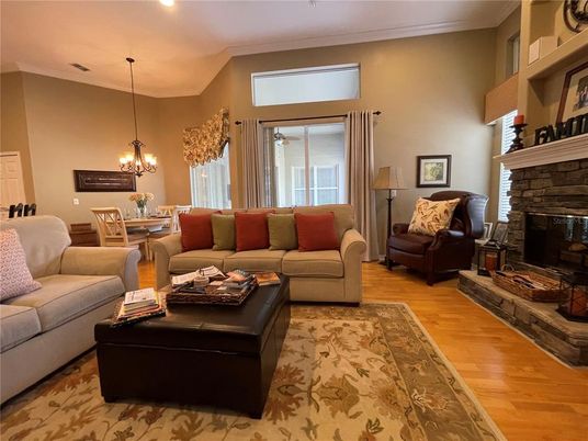 Chandelier, Dining room, Fireplace, Interior, Living room, Pendant Lights, Wood Texture Flooring
