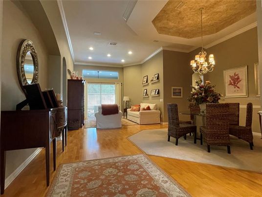 Chandelier, Dining room, Interior, Living room, Piano, Recessed Lighting, Wood Texture Flooring