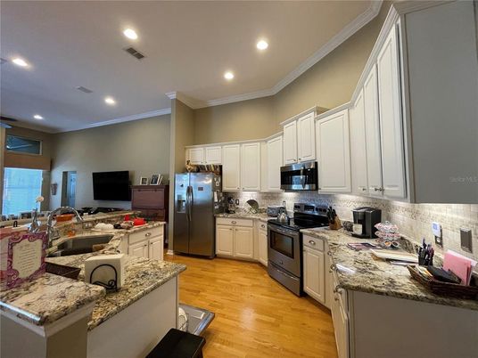 Interior, Kitchen, Recessed Lighting, Stainless Steel Appliances, Wood Texture Flooring