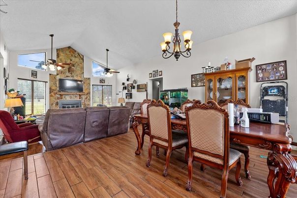Chandelier, Dining room, Fireplace, Interior, Living room, Wood Texture Flooring