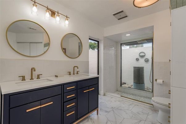 Bathroom, Dual Sink Vanities, Glass Shower, Interior, Marble, Recessed Lighting