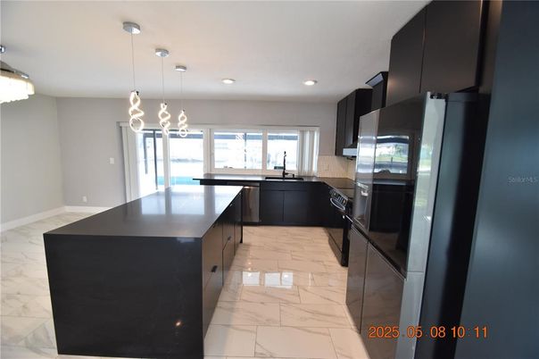 Interior, Kitchen, Marble, Pendant Lights, Recessed Lighting, Stainless Steel Appliances