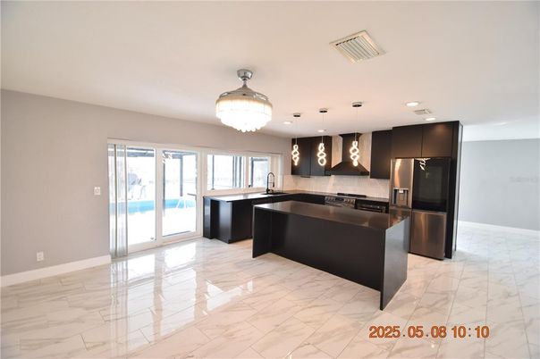 Chandelier, Interior, Kitchen, Marble, Pendant Lights, Recessed Lighting, Stainless Steel Appliances