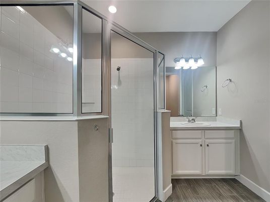 Bathroom, Glass Shower, Interior, Recessed Lighting, Wood Texture Flooring