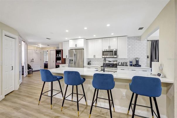 Interior, Kitchen, Recessed Lighting, Stainless Steel Appliances, Wood Texture Flooring