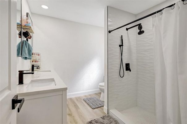 Bathroom, Glass Shower, Interior, Recessed Lighting, Wood Texture Flooring
