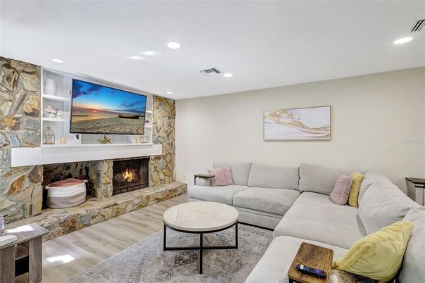 Fireplace, Interior, Living room, Recessed Lighting, Wood Texture Flooring