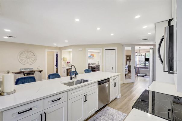 Interior, Kitchen, Pendant Lights, Recessed Lighting, Stainless Steel Appliances, Wood Texture Flooring