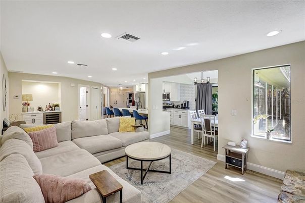 Chandelier, Dining room, Interior, Kitchen, Living room, Pendant Lights, Recessed Lighting, Wood Texture Flooring