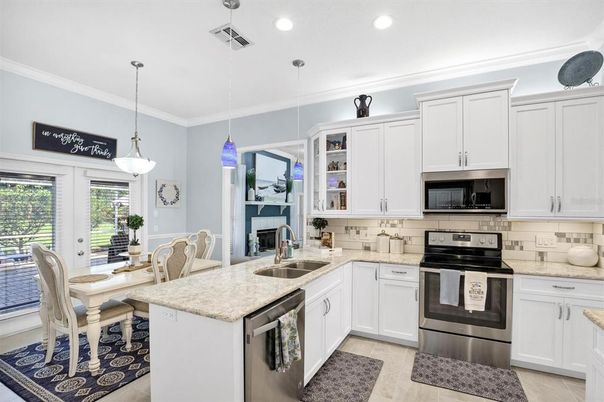 Dining room, Fireplace, Interior, Kitchen, Pendant Lights, Recessed Lighting, Stainless Steel Appliances