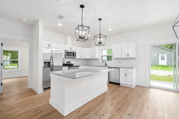 Interior, Kitchen, Pendant Lights, Recessed Lighting, Stainless Steel Appliances, Wood Texture Flooring