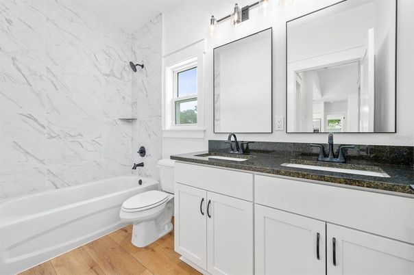 Bathroom, Dual Sink Vanities, Interior, Marble Walls, Wood Texture Flooring
