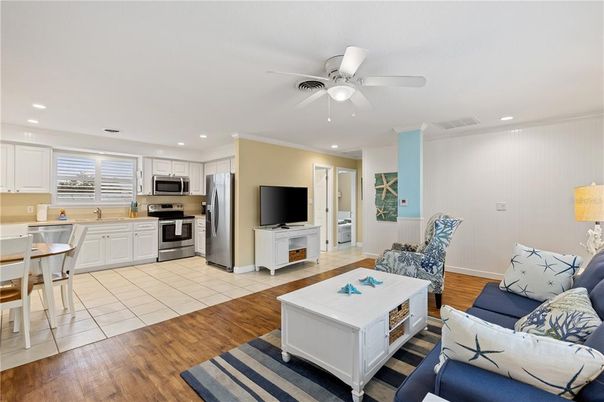 Dining room, Interior, Kitchen, Living room, Recessed Lighting, Stainless Steel Appliances, Wood Texture Flooring