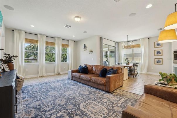 Chandelier, Dining room, Interior, Living room, Recessed Lighting, Wood Texture Flooring