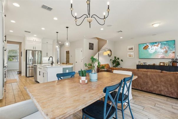 Dining room, Interior, Kitchen, Living room, Pendant Lights, Recessed Lighting, Stainless Steel Appliances, Wood Texture Flooring
