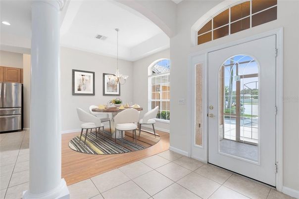 Chandelier, Dining room, Interior, Kitchen, Pendant Lights, Recessed Lighting, Stainless Steel Appliances, Wood Texture Flooring