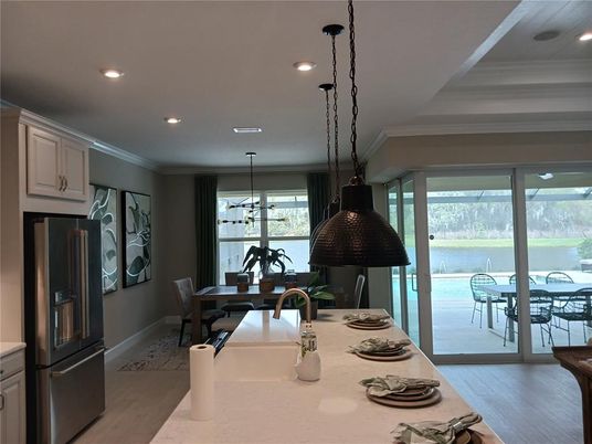 Dining room, Interior, Kitchen, Pendant Lights, Recessed Lighting, Water, Wood Texture Flooring