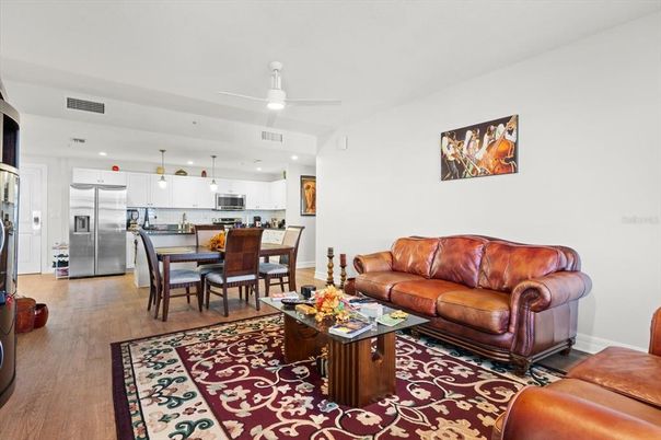 Dining room, Interior, Kitchen, Living room, Pendant Lights, Recessed Lighting, Stainless Steel Appliances, Wood Texture Flooring