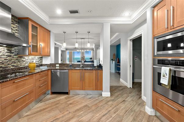 Interior, Kitchen, Pendant Lights, Recessed Lighting, Stainless Steel Appliances, Wood Texture Flooring
